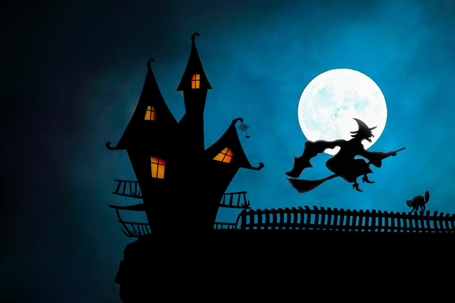 Graphic with a witch on a broom flying in front of a Halloween house.