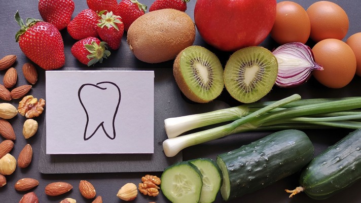 Image of healthy foods with a drawing of a tooth