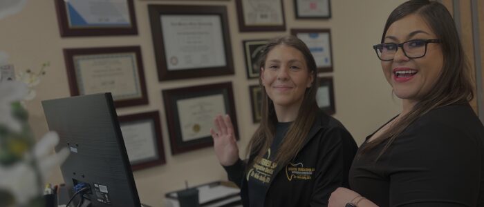 Untitled-1 Dr. Oushy working on a patient